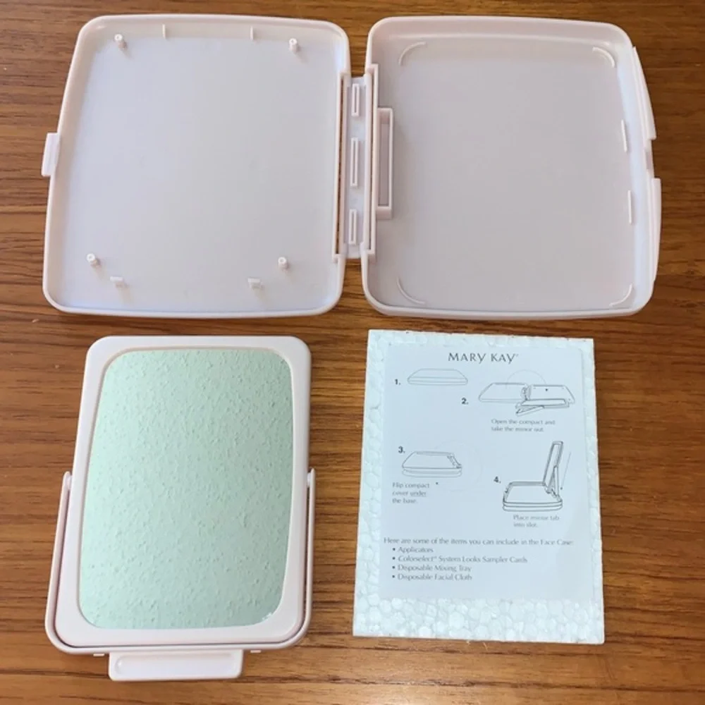 Mary Kay pink plastic compact travel mirror.